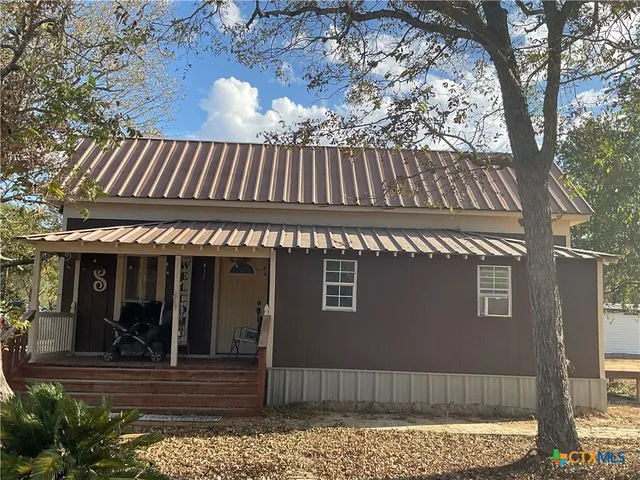 a view of a house with a porch