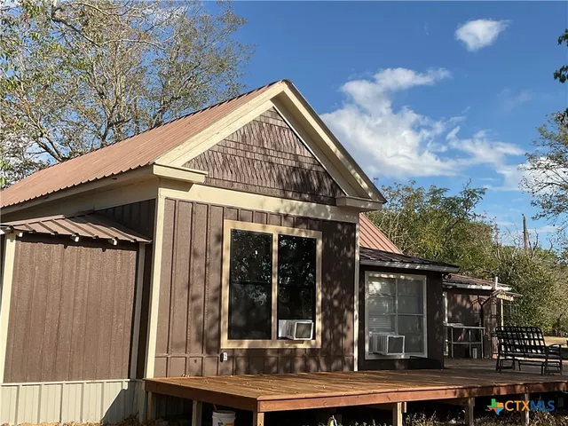 a view of house with a outdoor space