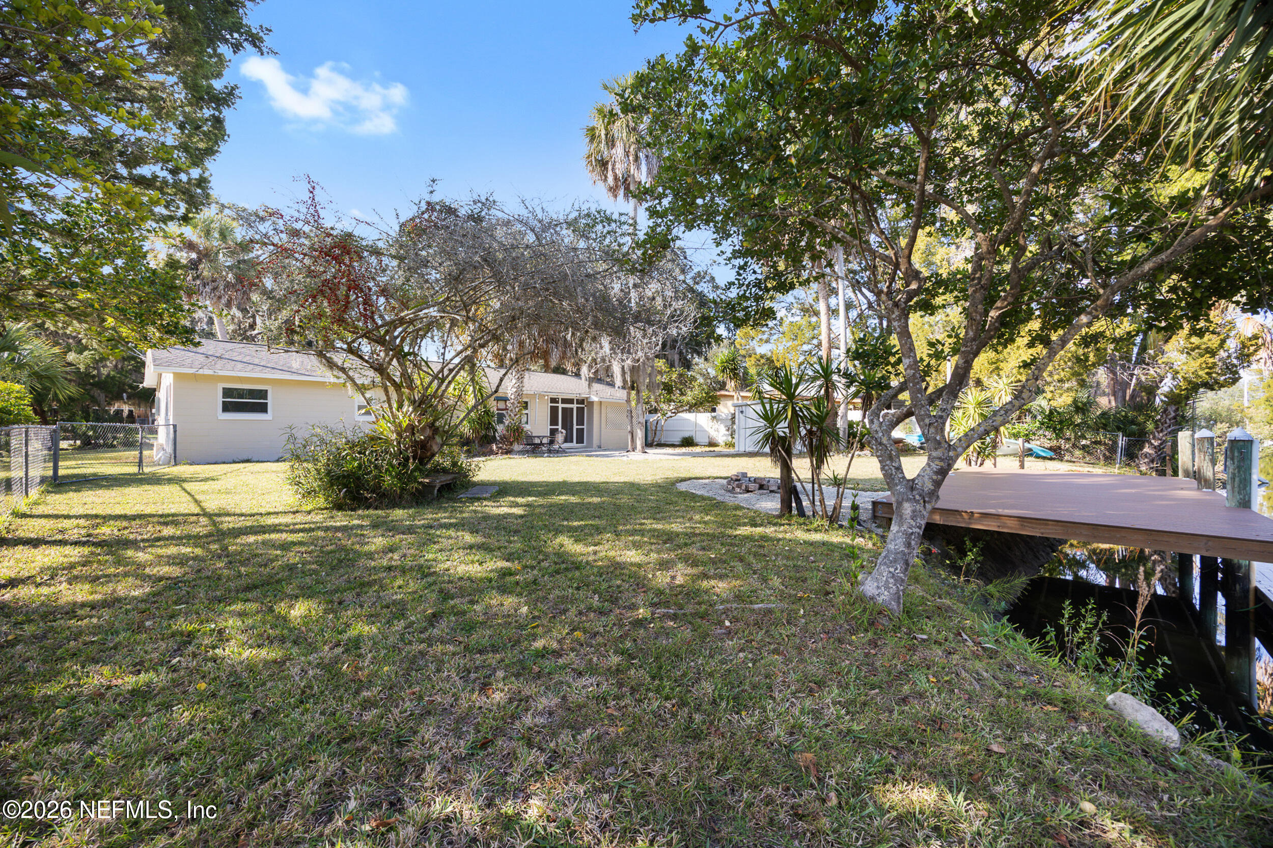 17 Palm Drive Yankeetown, FL 34498 - Photo 30 of 45 a view of a house with a yard
