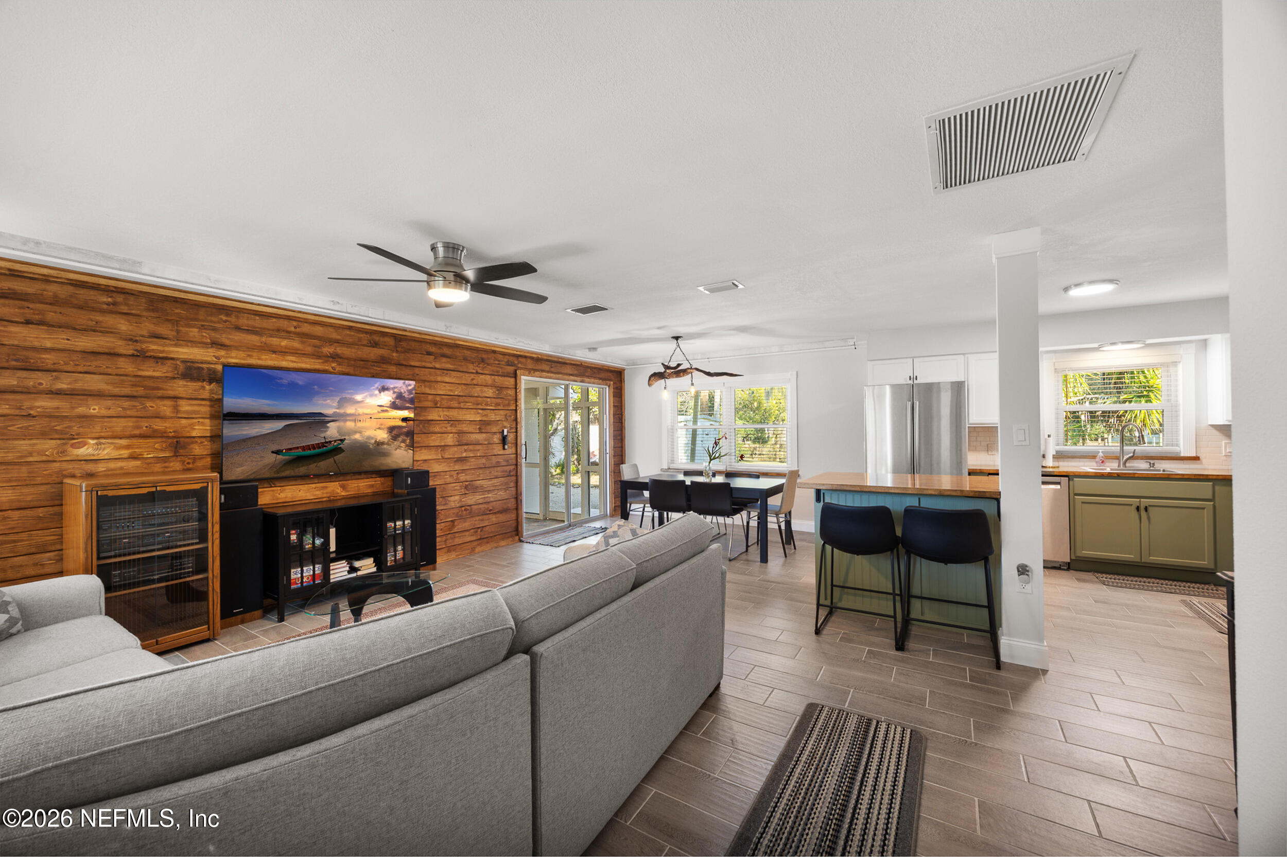 17 Palm Drive Yankeetown, FL 34498 - Photo 8 of 45 a living room with furniture and a fireplace