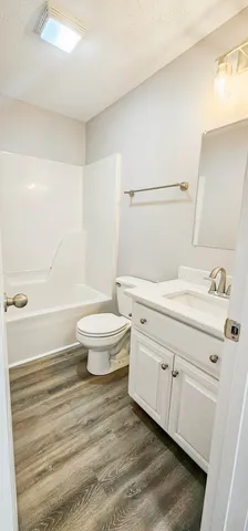 a view of a bathroom with a sink and a shower