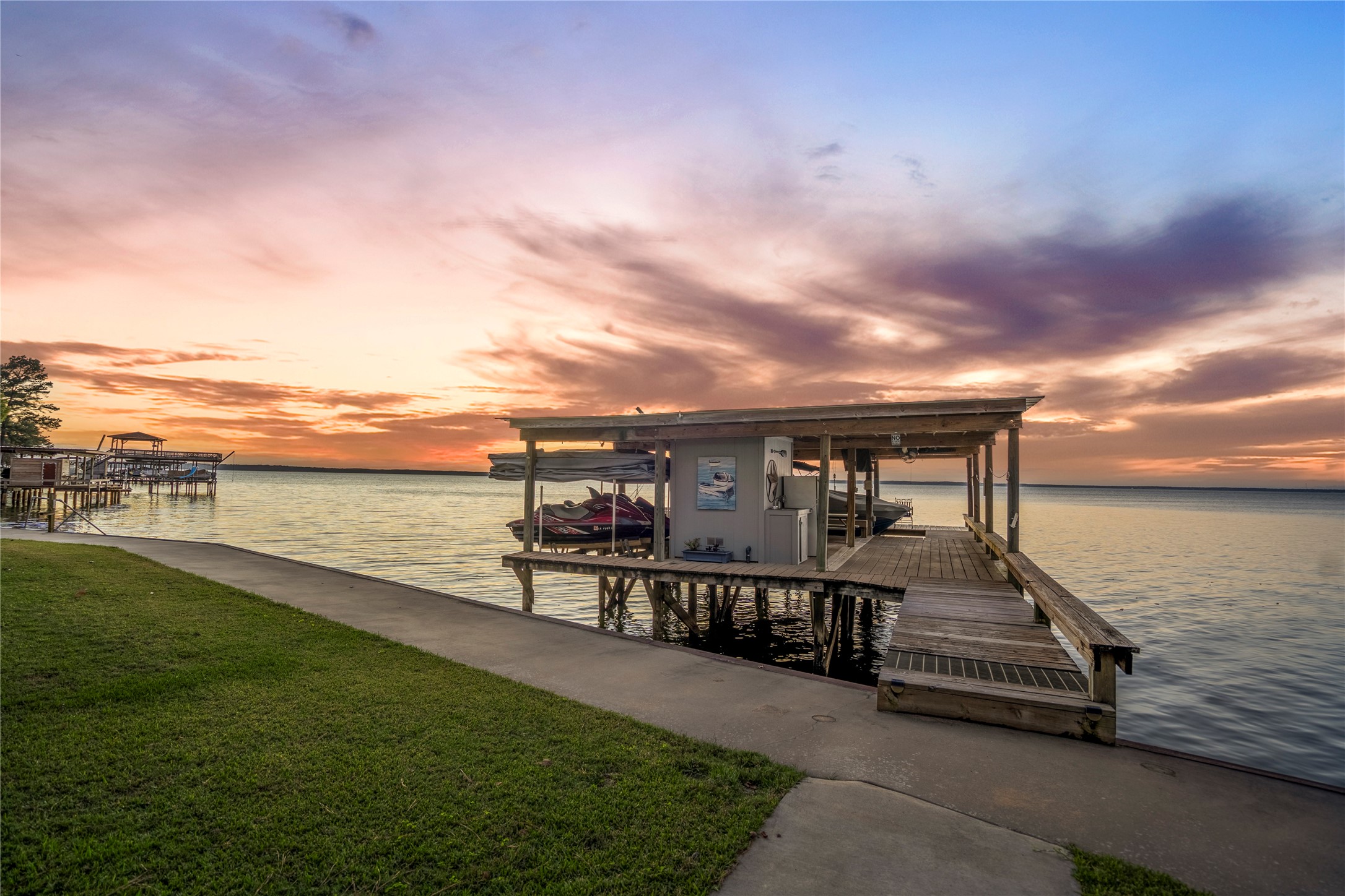 615 Inlet Drive Livingston, TX 77351 - Photo 3 of 50 This dock offers space for your boat, jet skis and extra space to relax and enjoy!