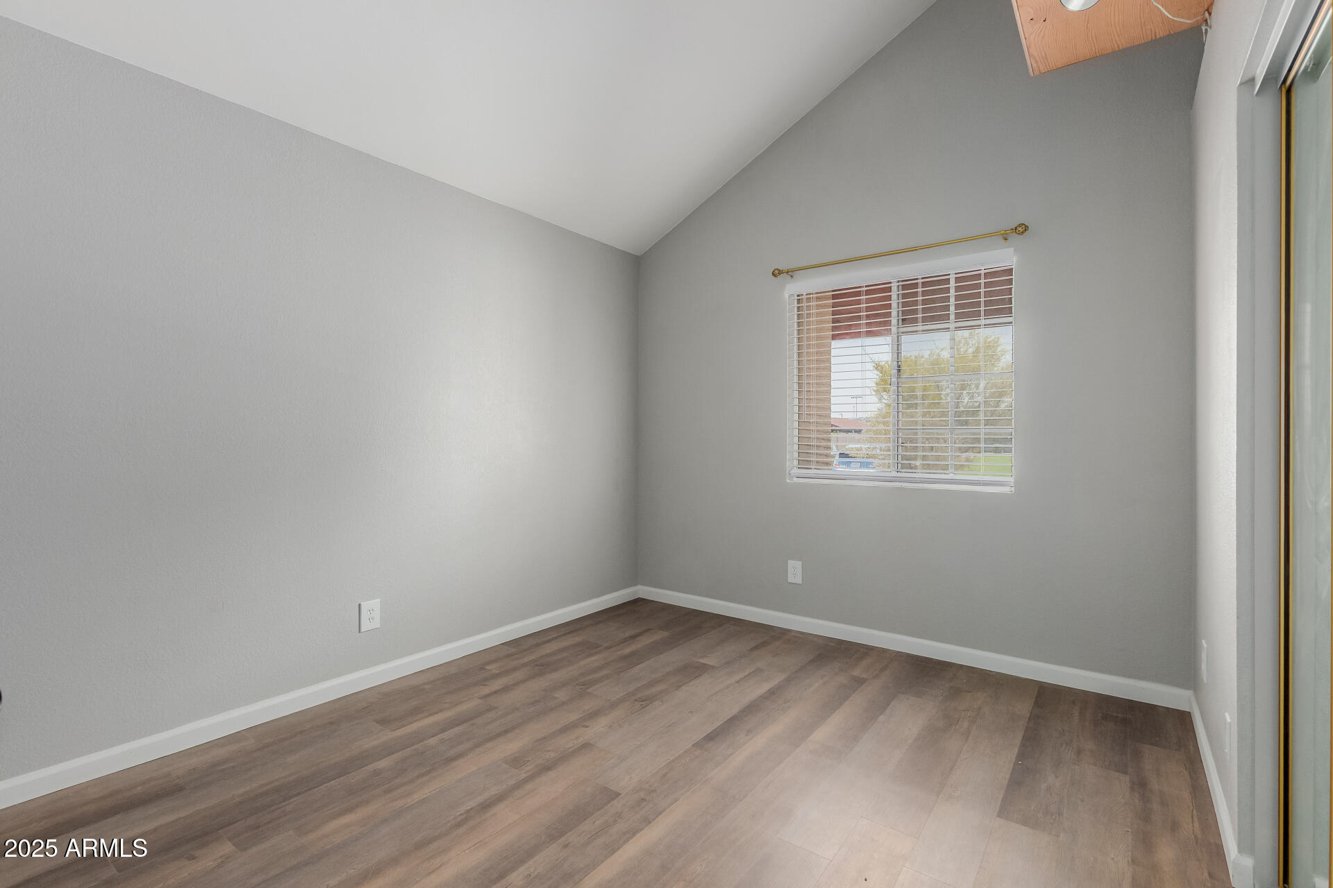 2144 East Center Lane, Unit 3 Tempe, AZ 85281 - Photo 16 of 30 an empty room with a window
