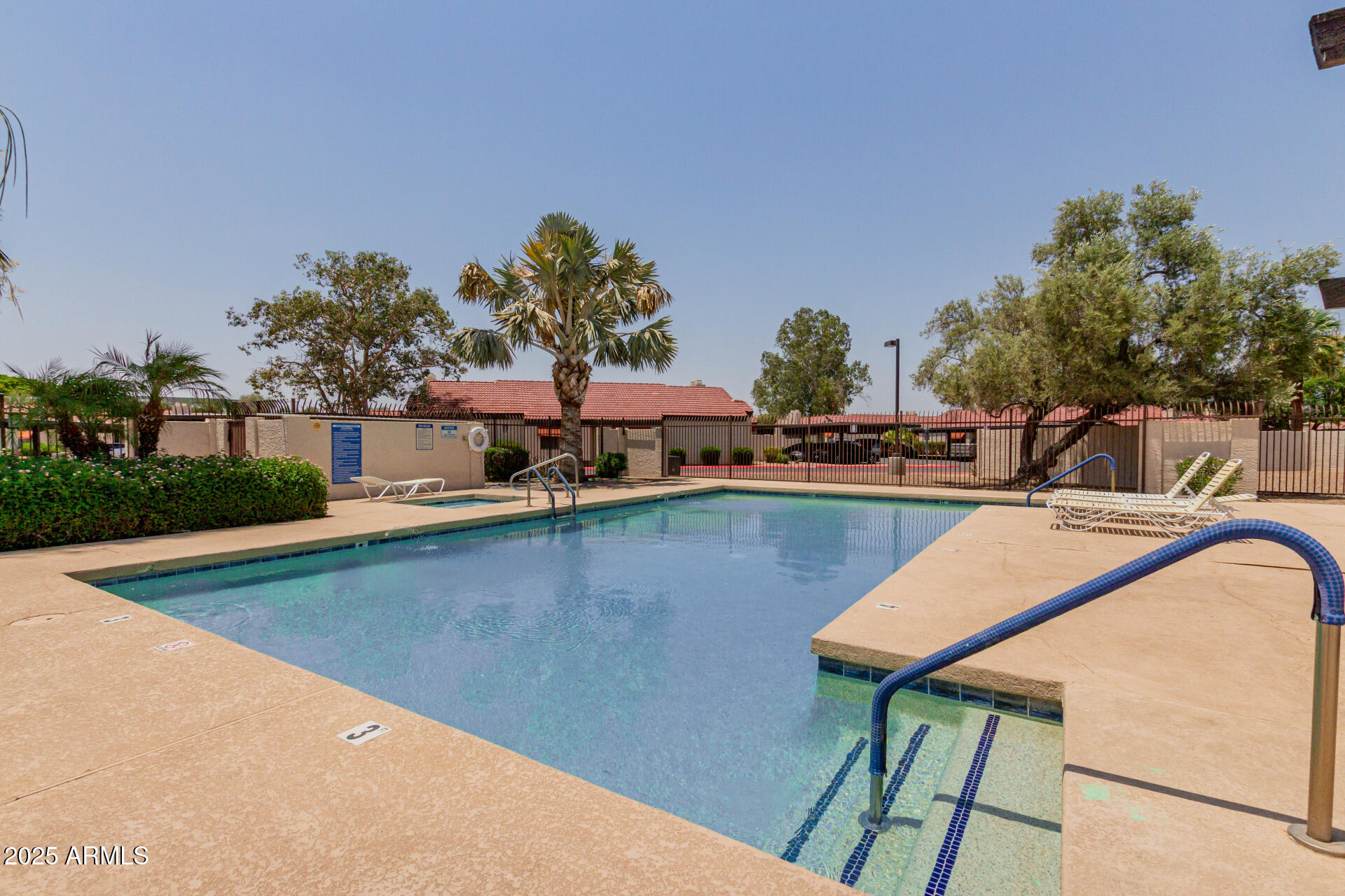 2144 East Center Lane, Unit 3 Tempe, AZ 85281 - Photo 27 of 30 a view of a swimming pool with an outdoor seating