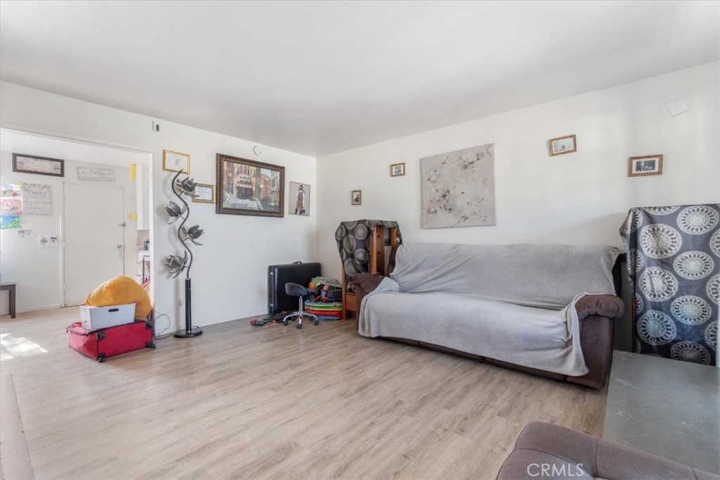 13645 Gilbert Street North Edwards, CA 93523 - Photo 3 of 12 a living room with furniture and a couch