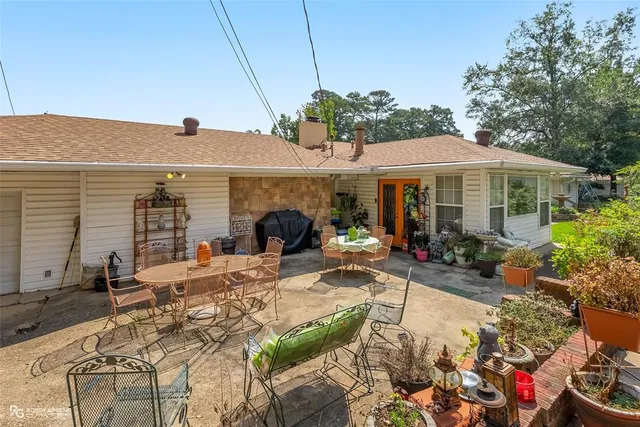 a view of a back yard of the house