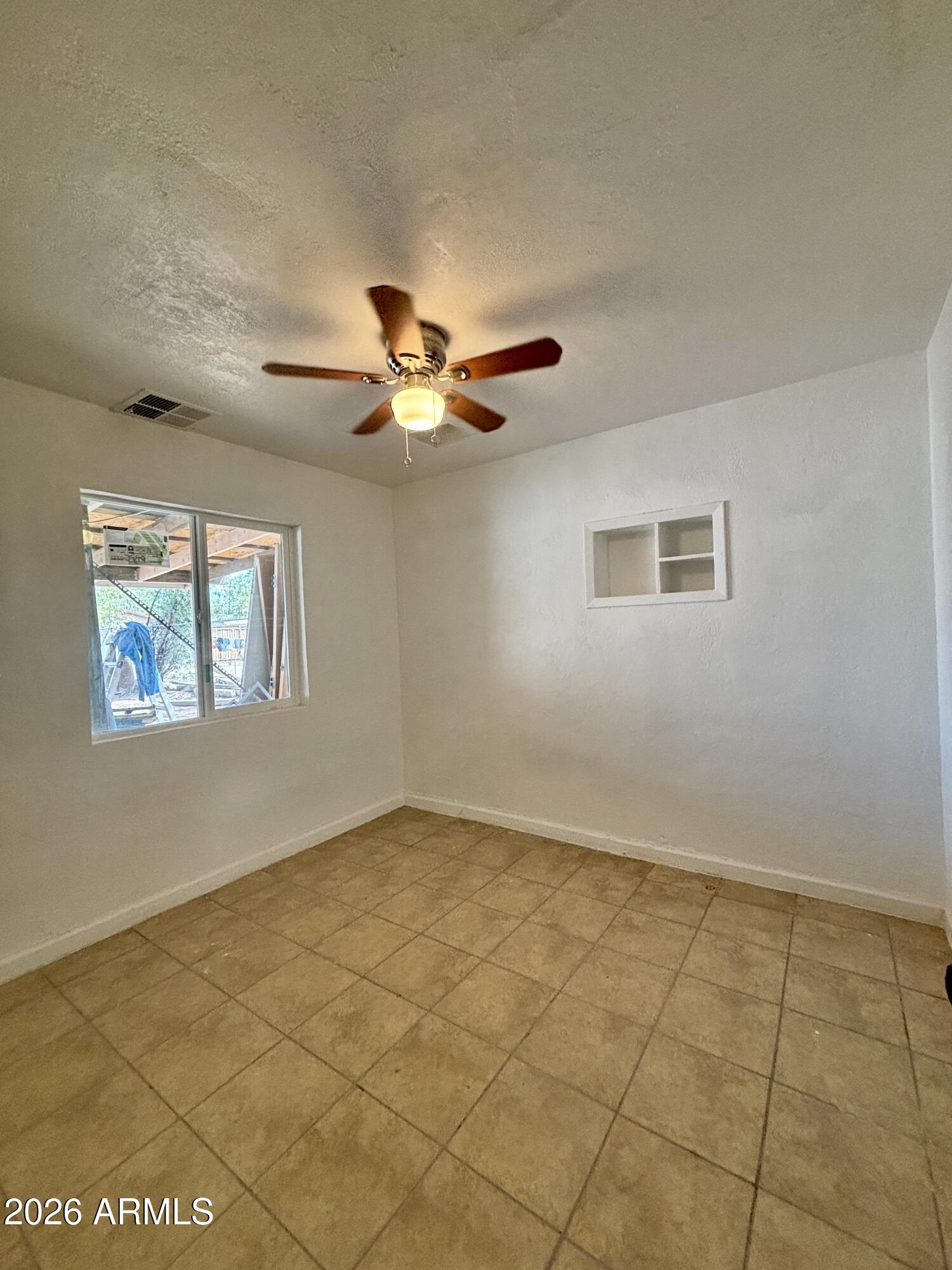 3036 West Almeria Road Phoenix, AZ 85009 - Photo 15 of 18 a view of an empty room