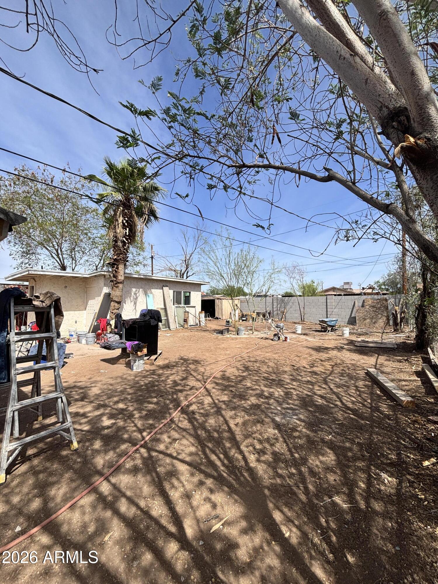 3036 West Almeria Road Phoenix, AZ 85009 - Photo 18 of 18 a view of a backyard with furniture