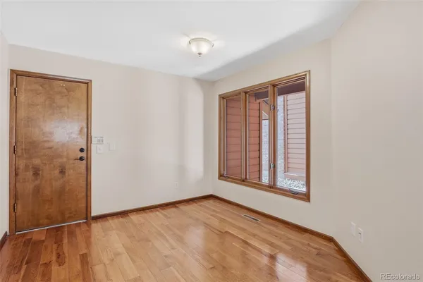 an empty room with window