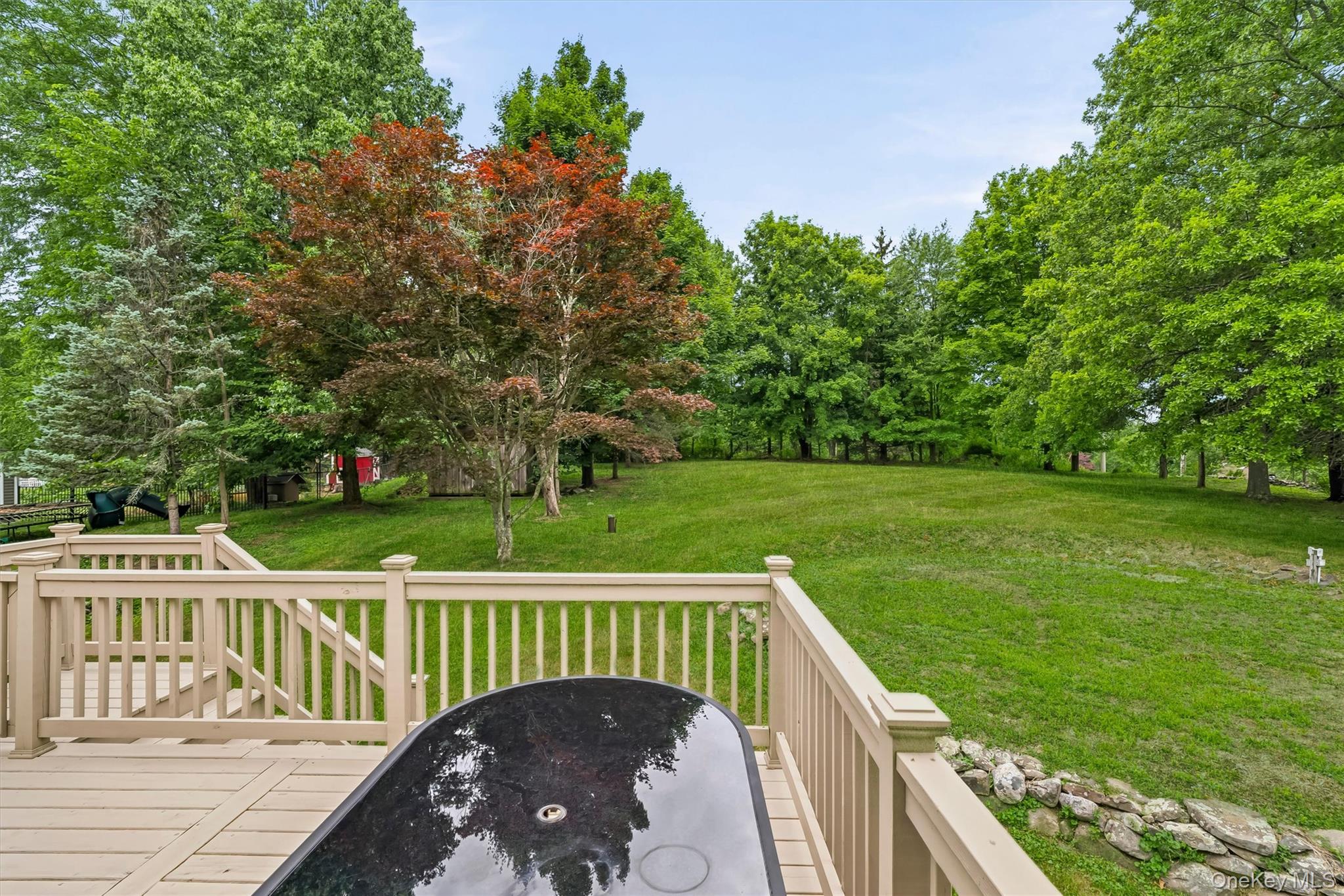 318 Beattie Road Washingtonville, NY 10992 - Photo 29 of 42 a view of a roof deck with wooden fence and floor