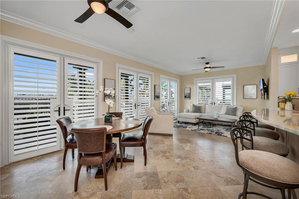 780 5th Avenue South, Unit 302 Naples, FL 34102 - Photo 8 of 20 Dining to Living View