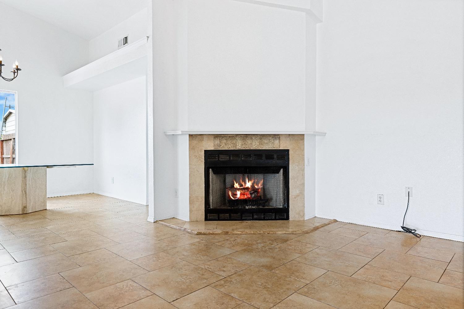 21596 Road 30 Madera, CA 93638 - Photo 11 of 57 a view of an empty room with a fireplace