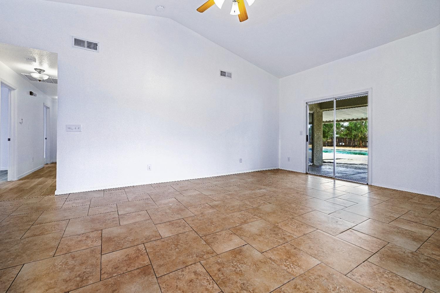 21596 Road 30 Madera, CA 93638 - Photo 13 of 57 an empty room with windows