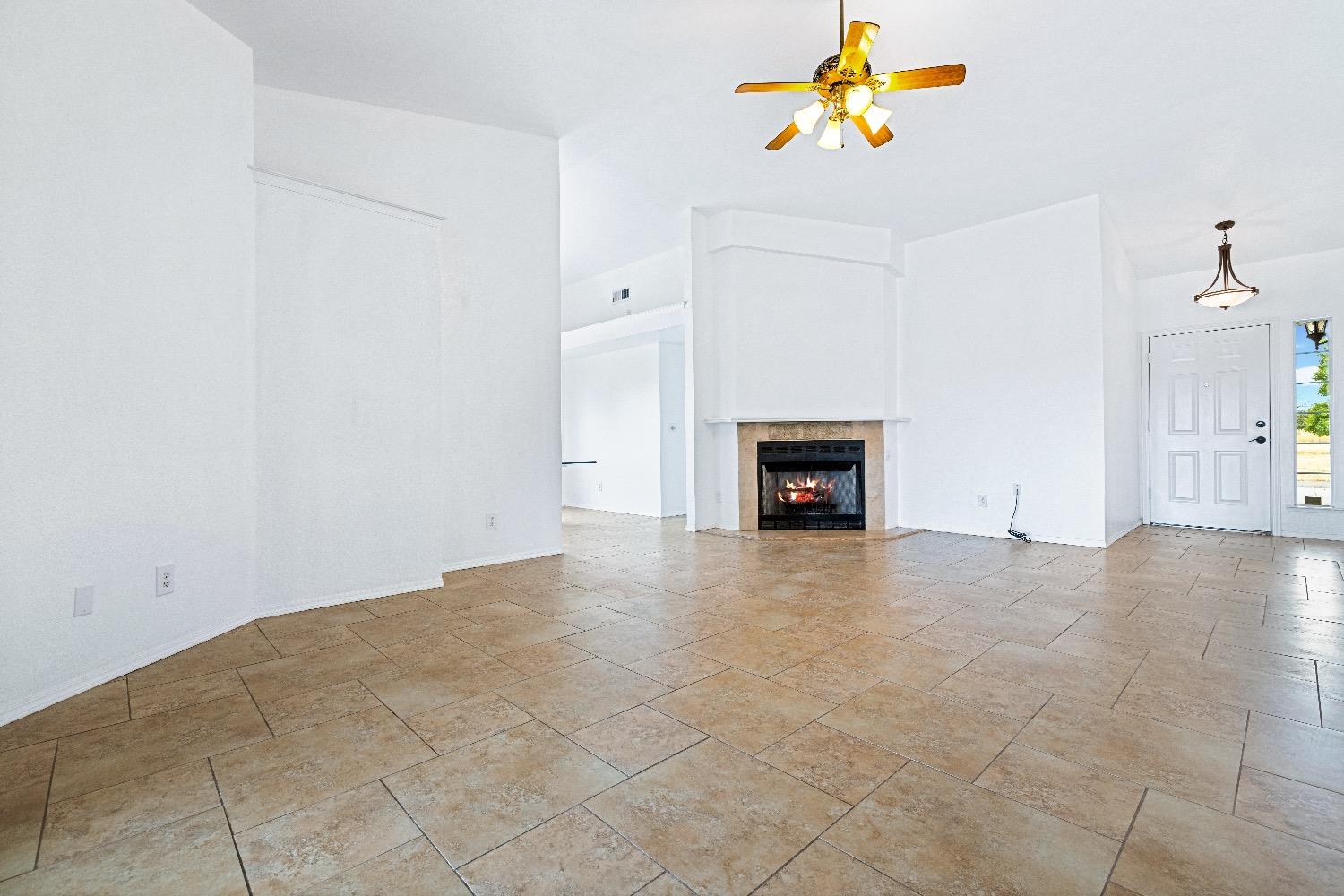 21596 Road 30 Madera, CA 93638 - Photo 15 of 57 a view of a livingroom with a fireplace