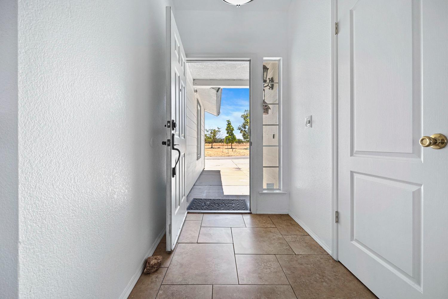 21596 Road 30 Madera, CA 93638 - Photo 21 of 57 a view of an entryway of a house