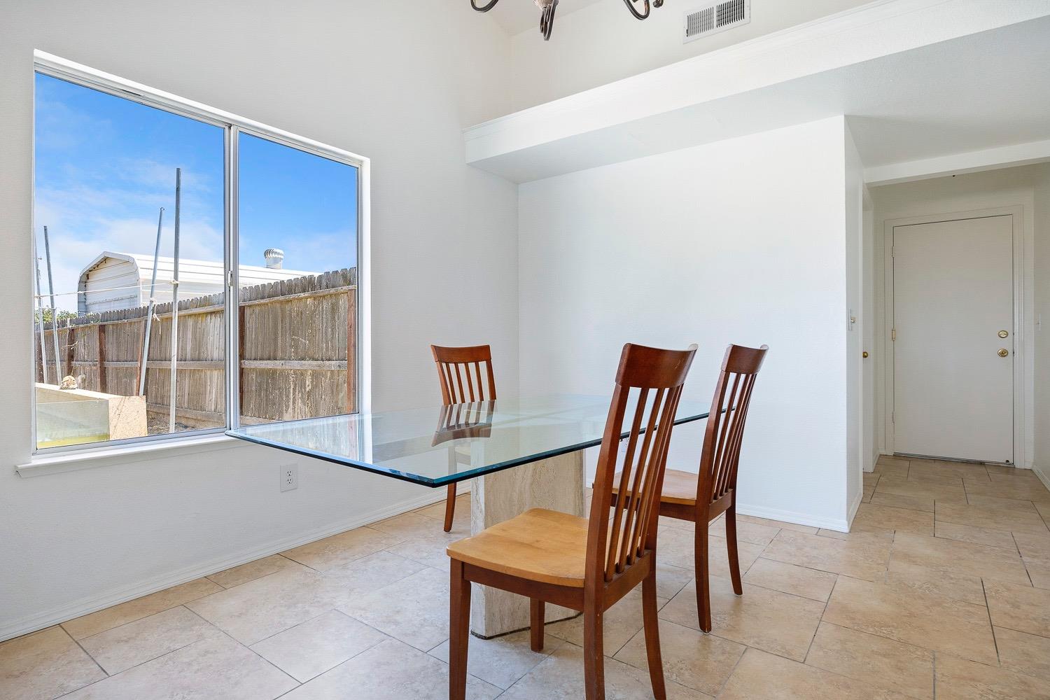 21596 Road 30 Madera, CA 93638 - Photo 23 of 57 a view of a room with furniture wooden floor and a window