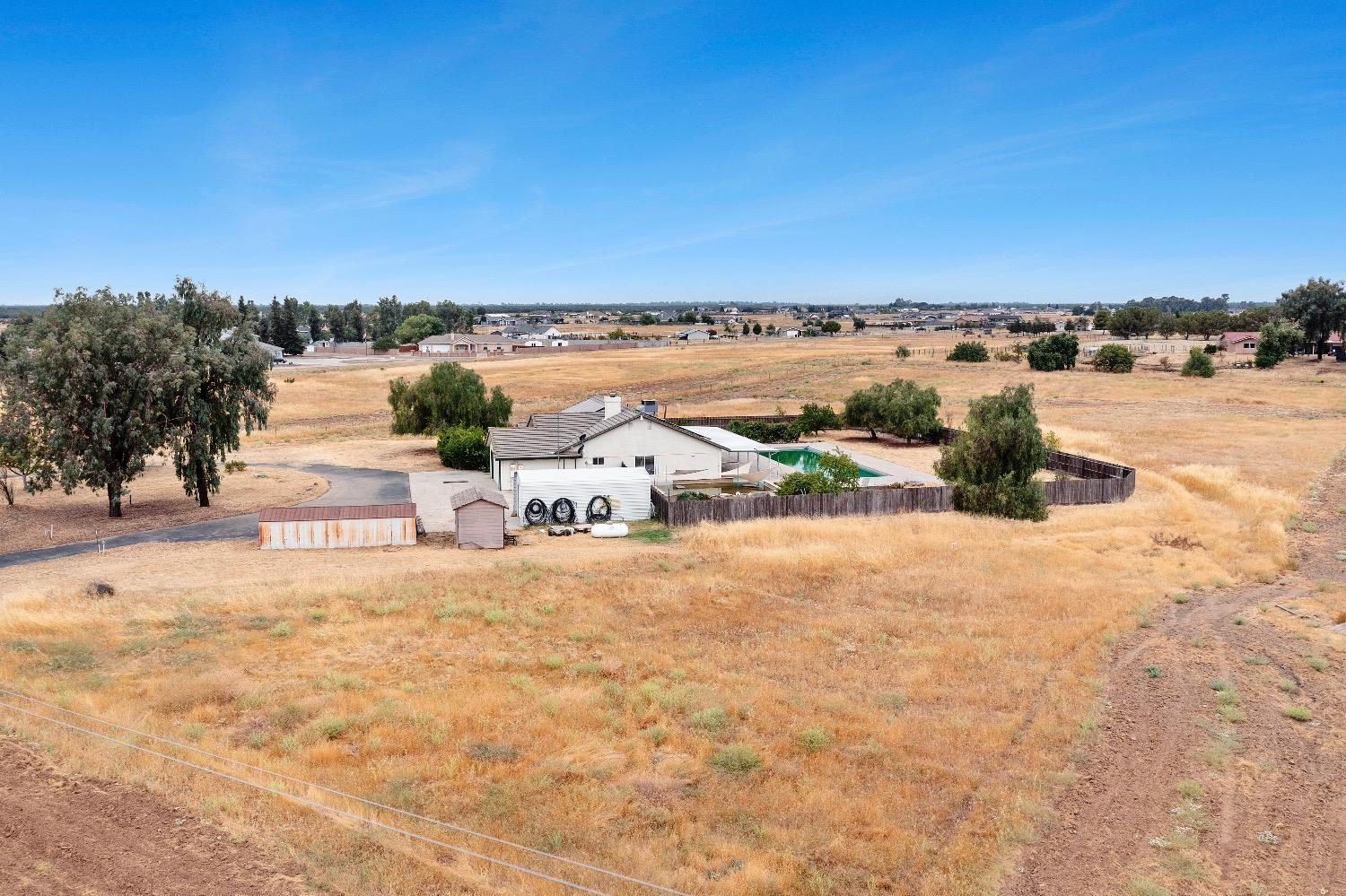 21596 Road 30 Madera, CA 93638 - Photo 3 of 57 a street view with ocean view