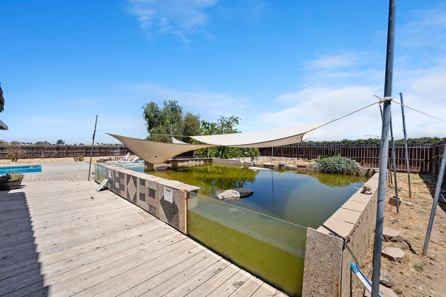 21596 Road 30 Madera, CA 93638 - Photo 55 of 57 a view of a balcony with chairs