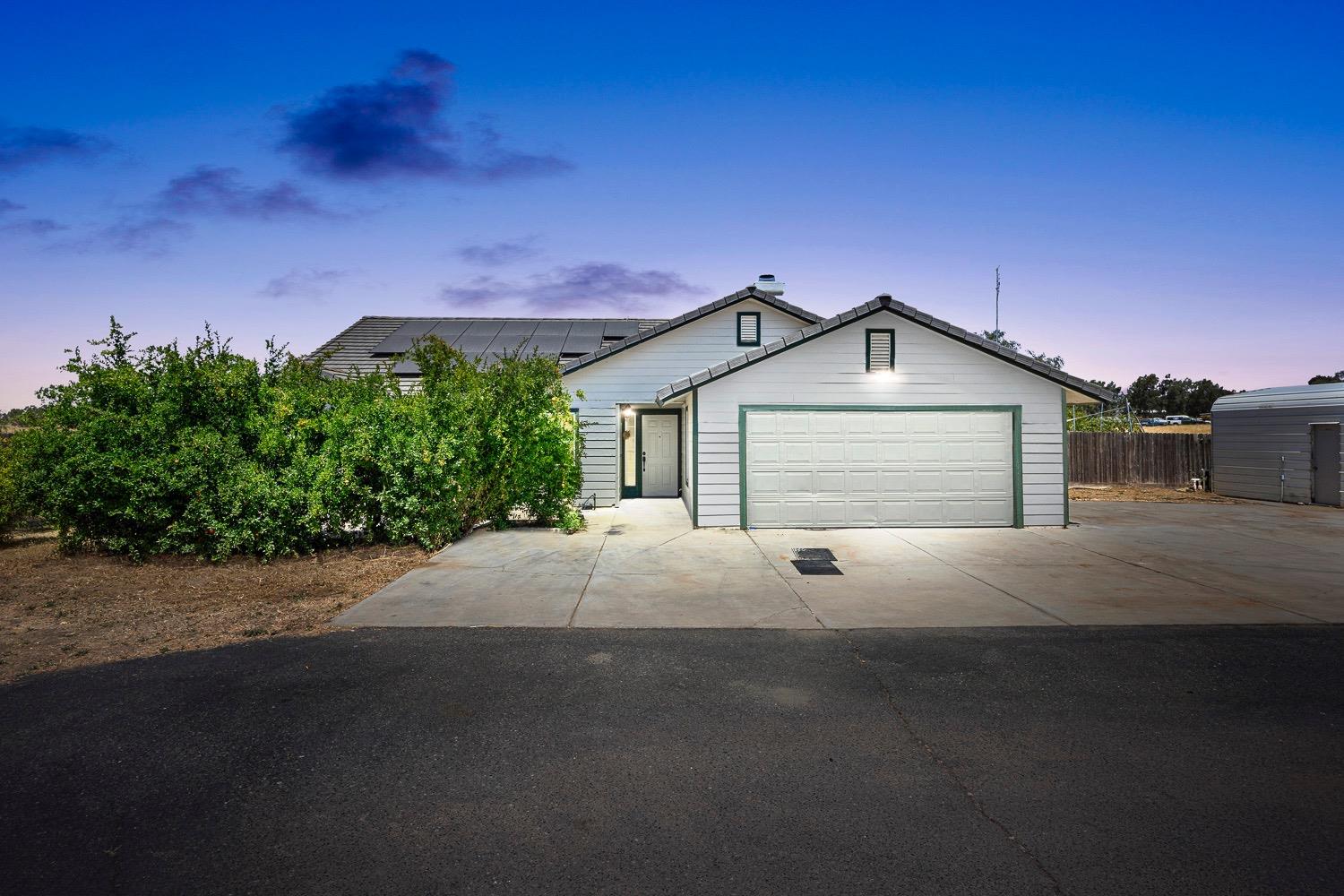 21596 Road 30 Madera, CA 93638 - Photo 57 of 57 a view of a house with a yard