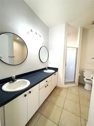a bathroom with a toilet and a bathtub