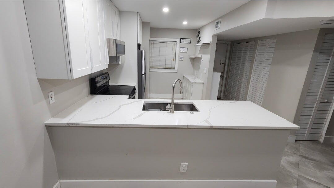 8605 West Sample Road, Unit 311 Coral Springs, FL 33065 - Photo 2 of 13 kit 2