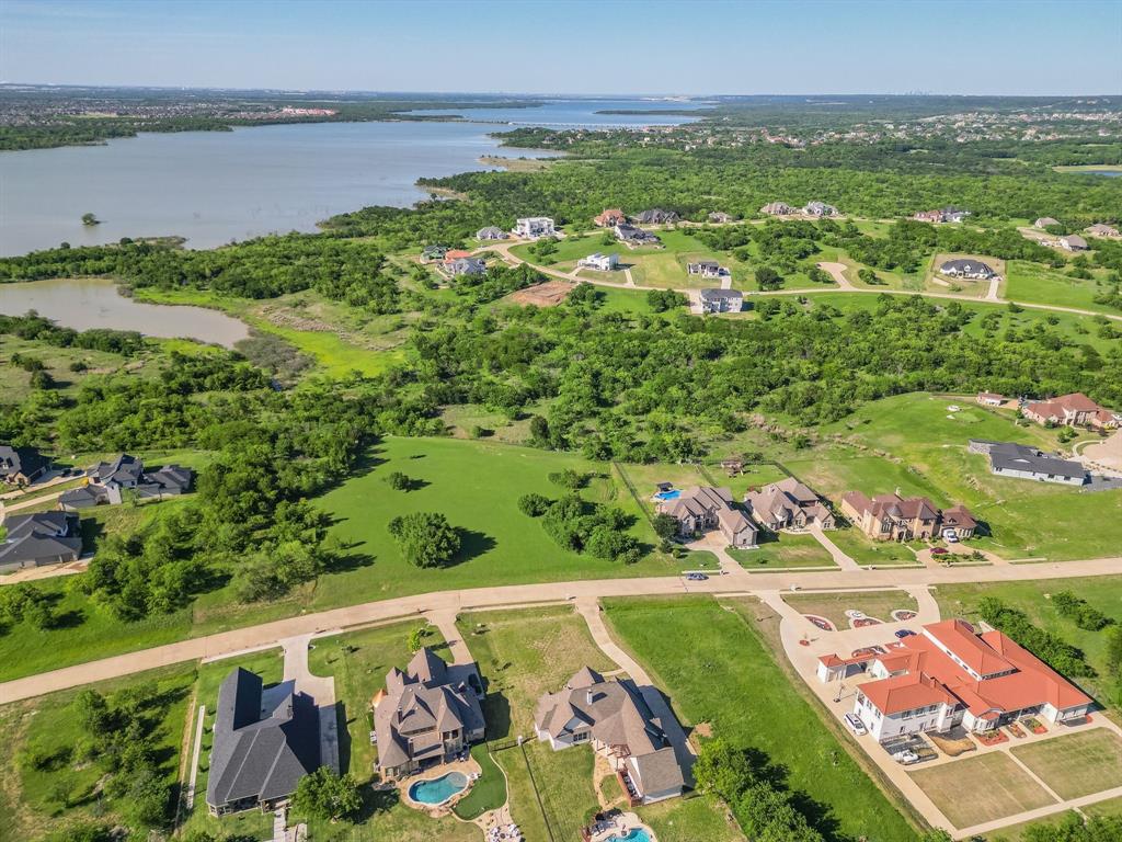3248 Koscher Drive Grand Prairie, TX 75104 - Photo 17 of 26 a view of a city and an ocean from a balcony
