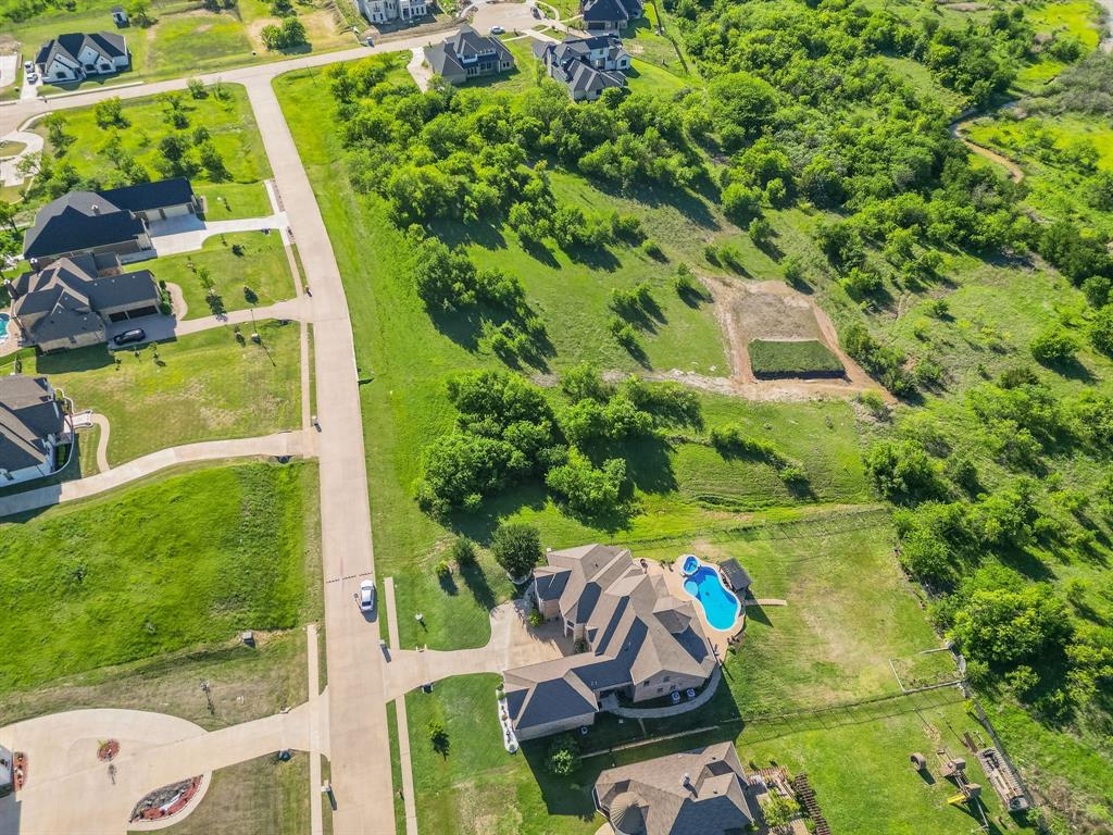 3248 Koscher Drive Grand Prairie, TX 75104 - Photo 26 of 26 a view of outdoor space with a garden