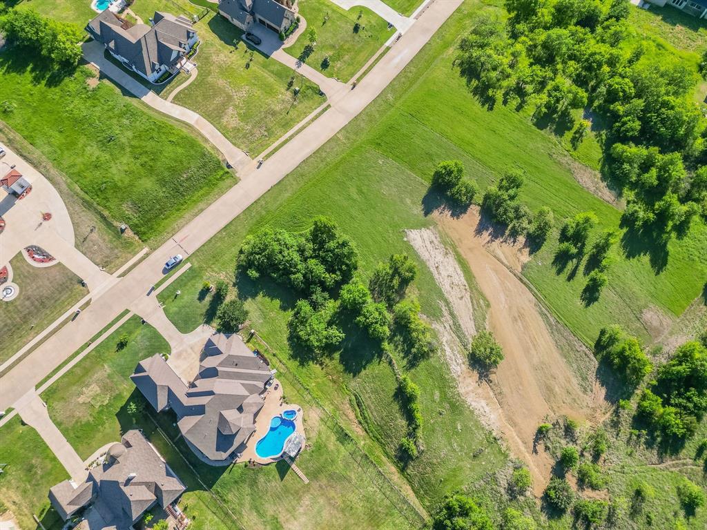 3248 Koscher Drive Grand Prairie, TX 75104 - Photo 4 of 26 an aerial view of a house with a yard