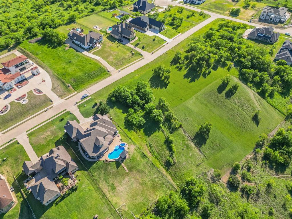 3248 Koscher Drive Grand Prairie, TX 75104 - Photo 6 of 26 an aerial view of a house with a yard