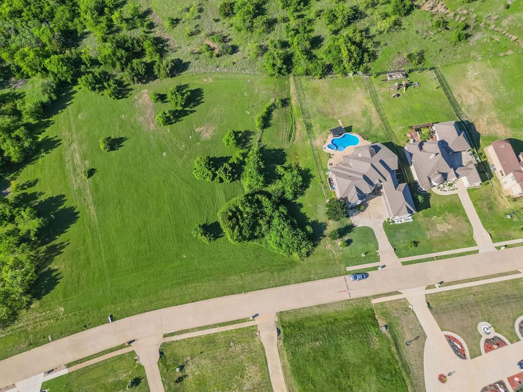 3248 Koscher Drive Grand Prairie, TX 75104 - Photo 10 of 26 a view of a lake with a yard