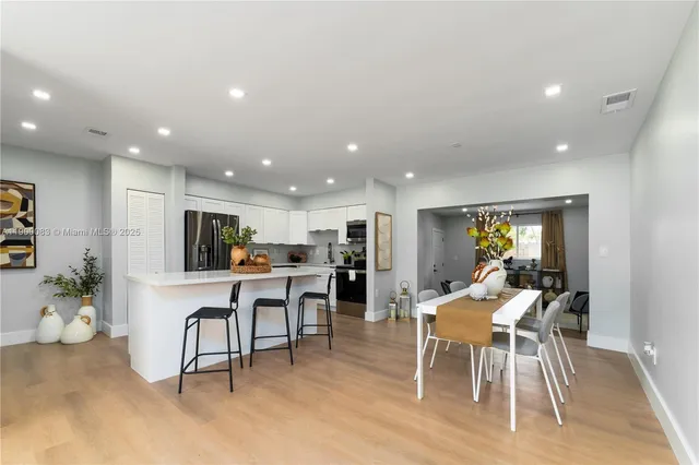 a view of a dining room with furniture