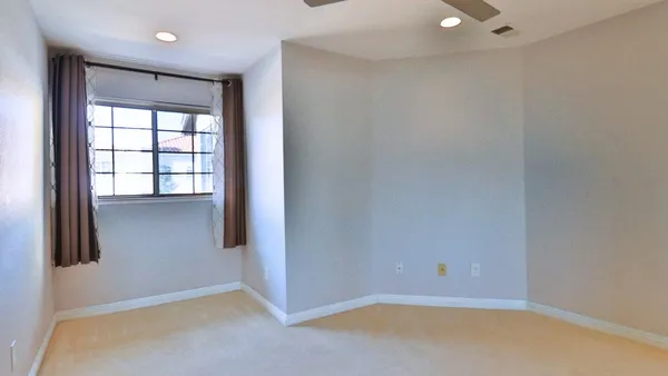 an empty room with windows