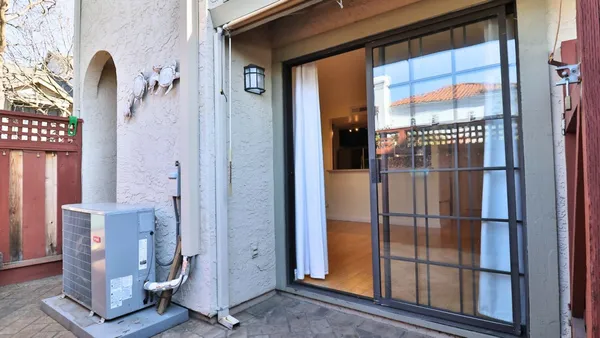 a view of a bathroom with a glass door