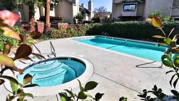 a view of outdoor space swimming pool and outdoor seating
