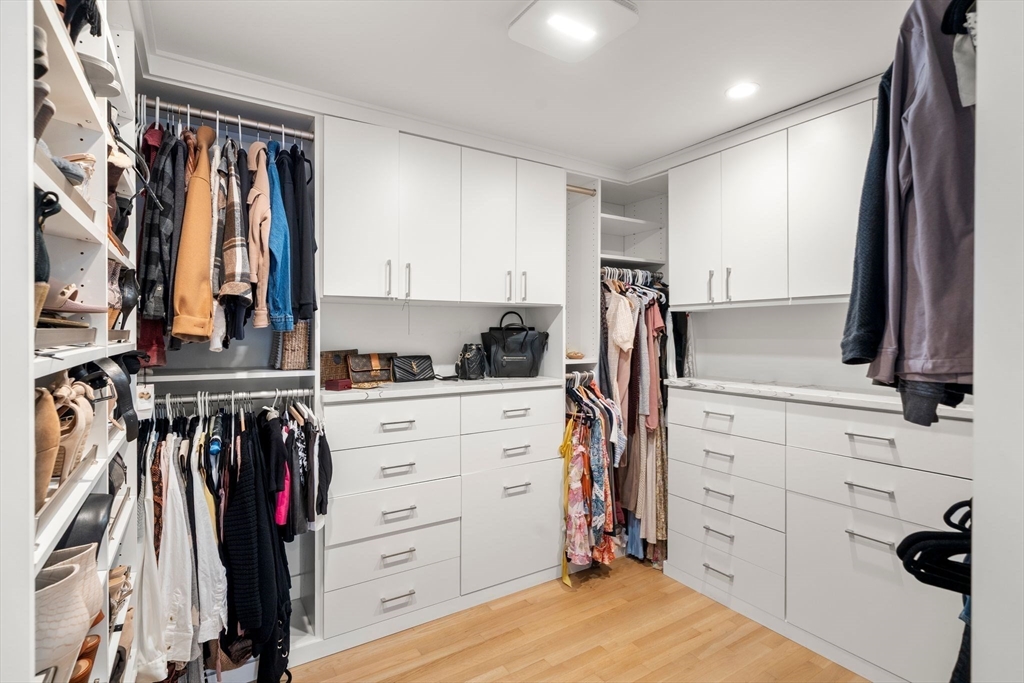 23 Tophet Road Lynnfield, MA 01940 - Photo 22 of 42 a view of walk in closet with clothes and shoes