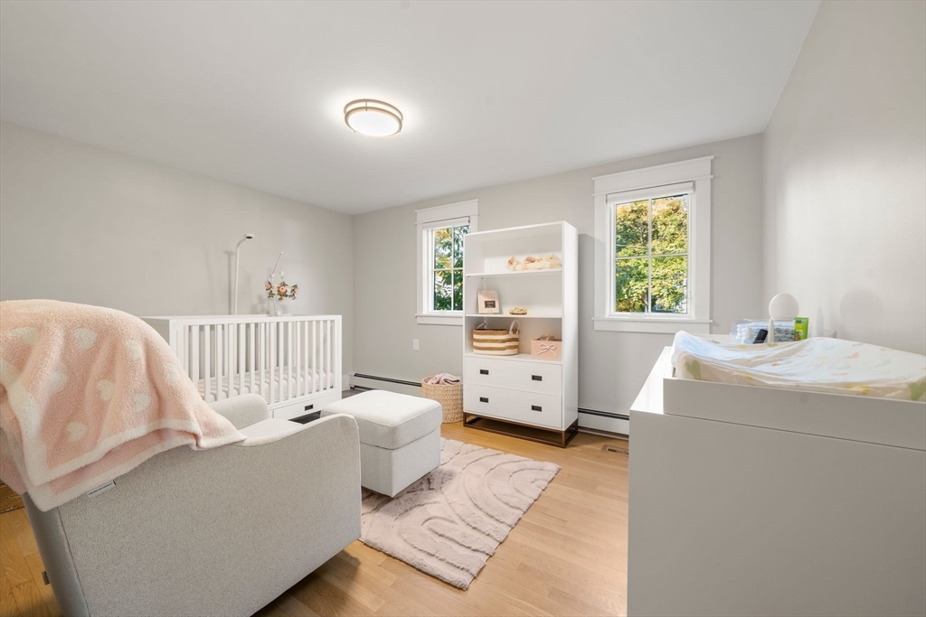 23 Tophet Road Lynnfield, MA 01940 - Photo 27 of 42 a bedroom with furniture and a window
