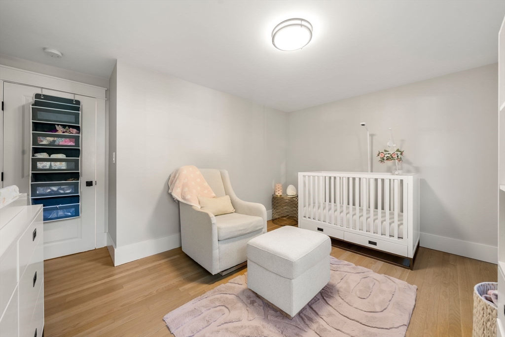 23 Tophet Road Lynnfield, MA 01940 - Photo 28 of 42 a bedroom with furniture and wooden floor
