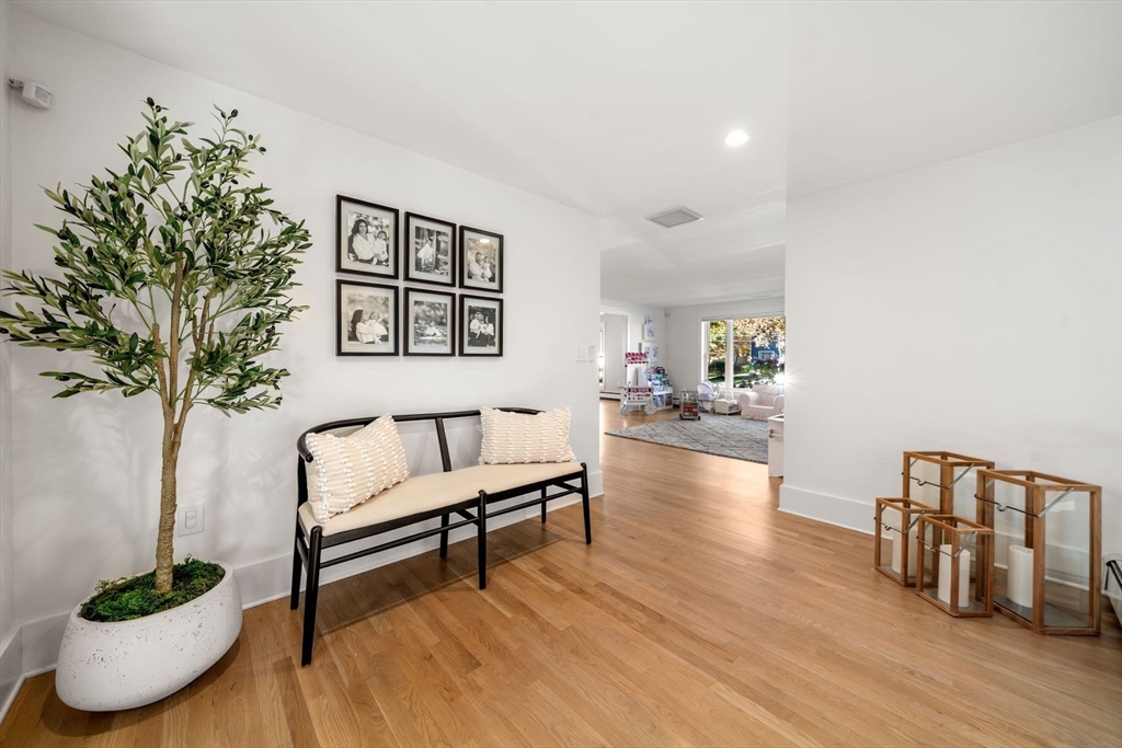 23 Tophet Road Lynnfield, MA 01940 - Photo 34 of 42 a living room with furniture and a potted plant
