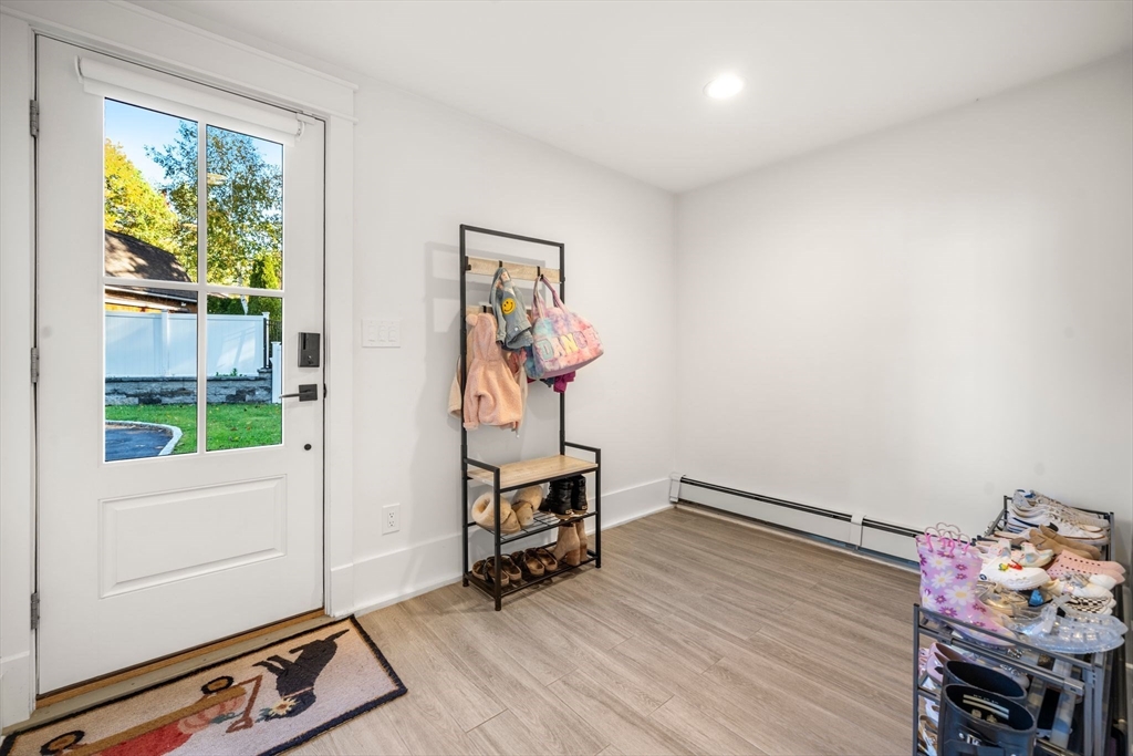 23 Tophet Road Lynnfield, MA 01940 - Photo 35 of 42 a room with furniture and a window