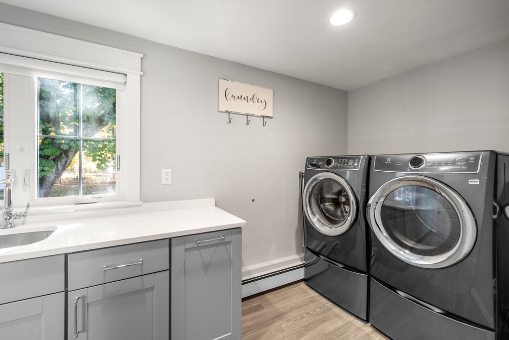 23 Tophet Road Lynnfield, MA 01940 - Photo 37 of 42 a utility room with sink dryer and washer