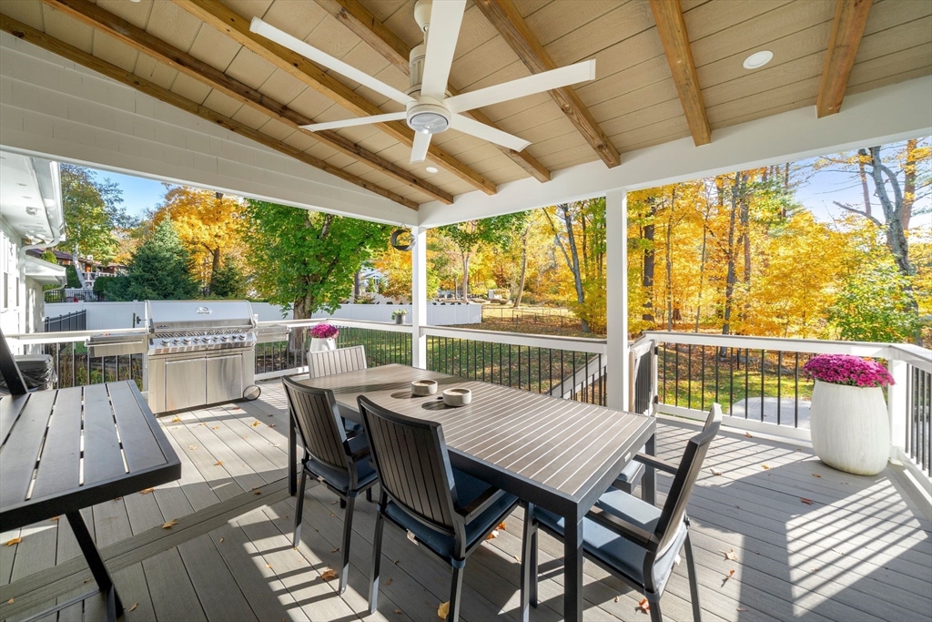 23 Tophet Road Lynnfield, MA 01940 - Photo 38 of 42 a view of a patio with a table chairs and a table