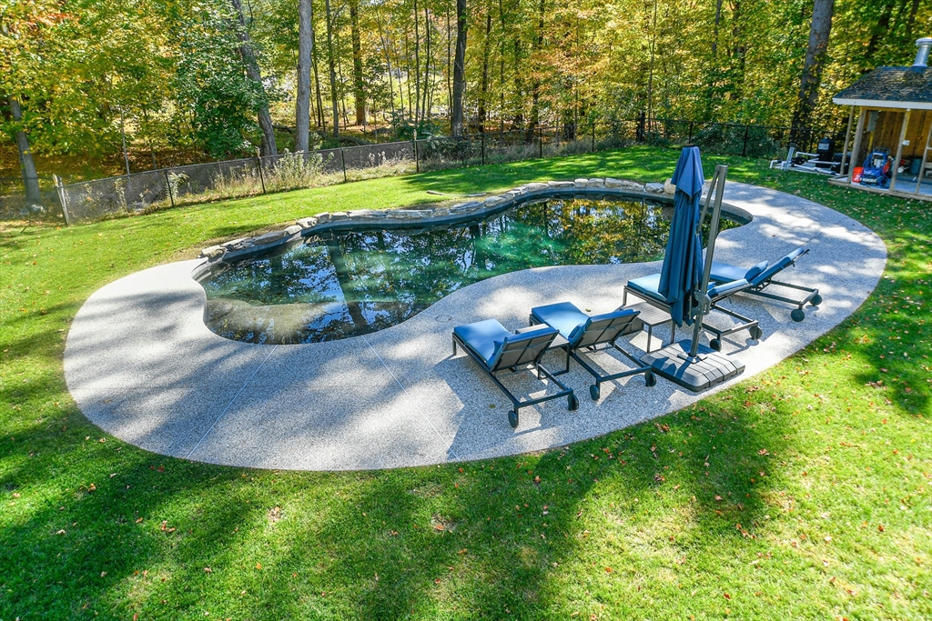 23 Tophet Road Lynnfield, MA 01940 - Photo 41 of 42 a view of a swimming pool with a yard