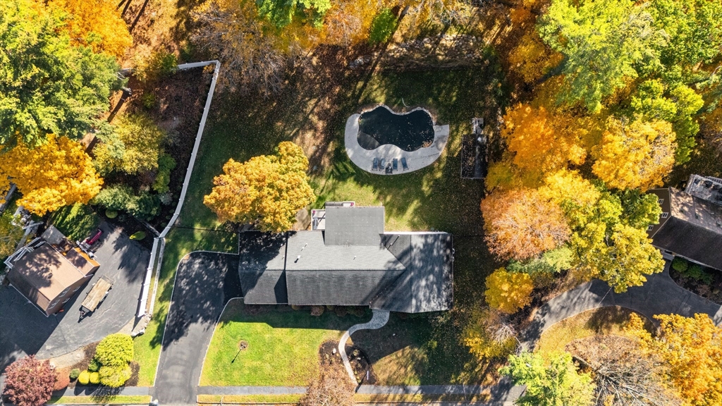 23 Tophet Road Lynnfield, MA 01940 - Photo 42 of 42 a view of a house with wooden fence and a tree