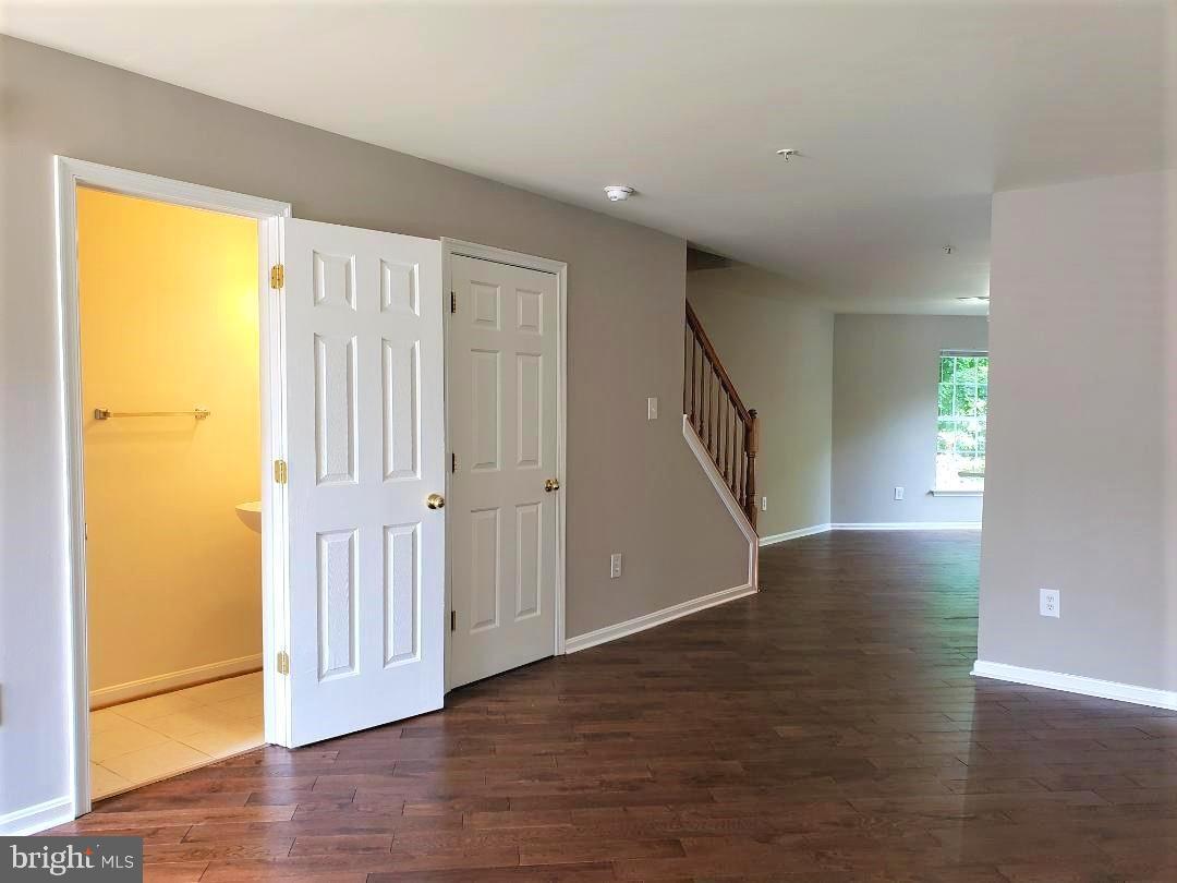 613 Tivoli Road Frederick, MD 21703 - Photo 3 of 23 Entrance w/ half bath towards kitchen dining area