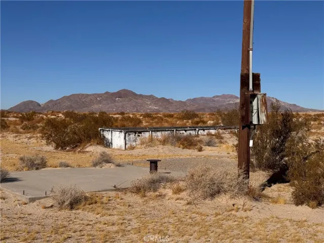 a view of a house with a mountain