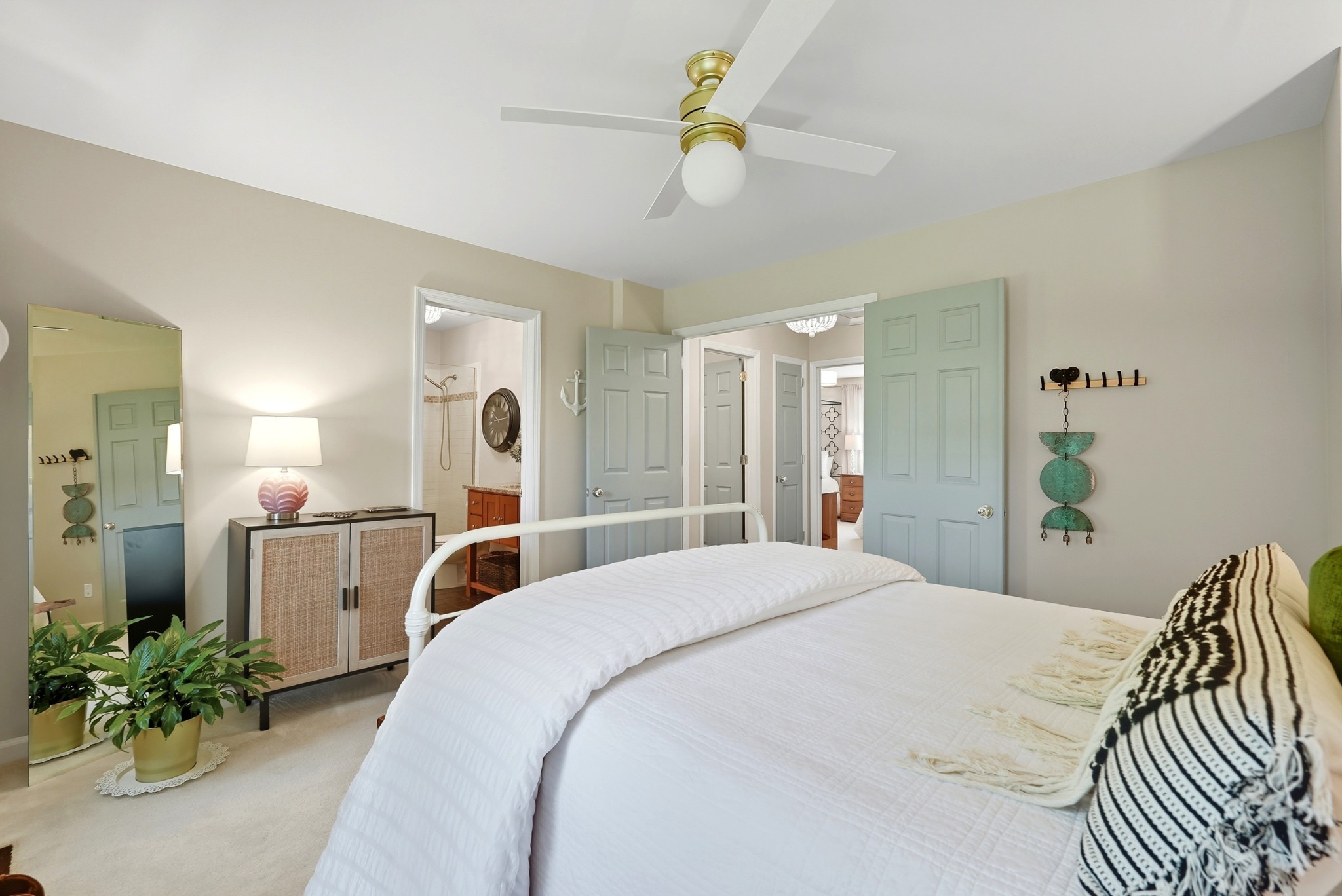 401 Huntington Ridge Drive Nashville, TN 37211 - Photo 18 of 38 a bedroom with a bed and a chandelier