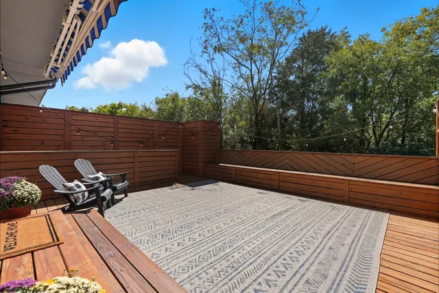 a view of a terrace with seating area