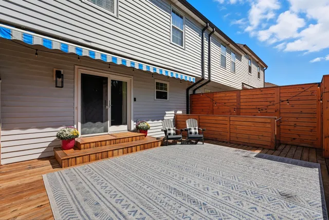 a backyard of a house with seating space