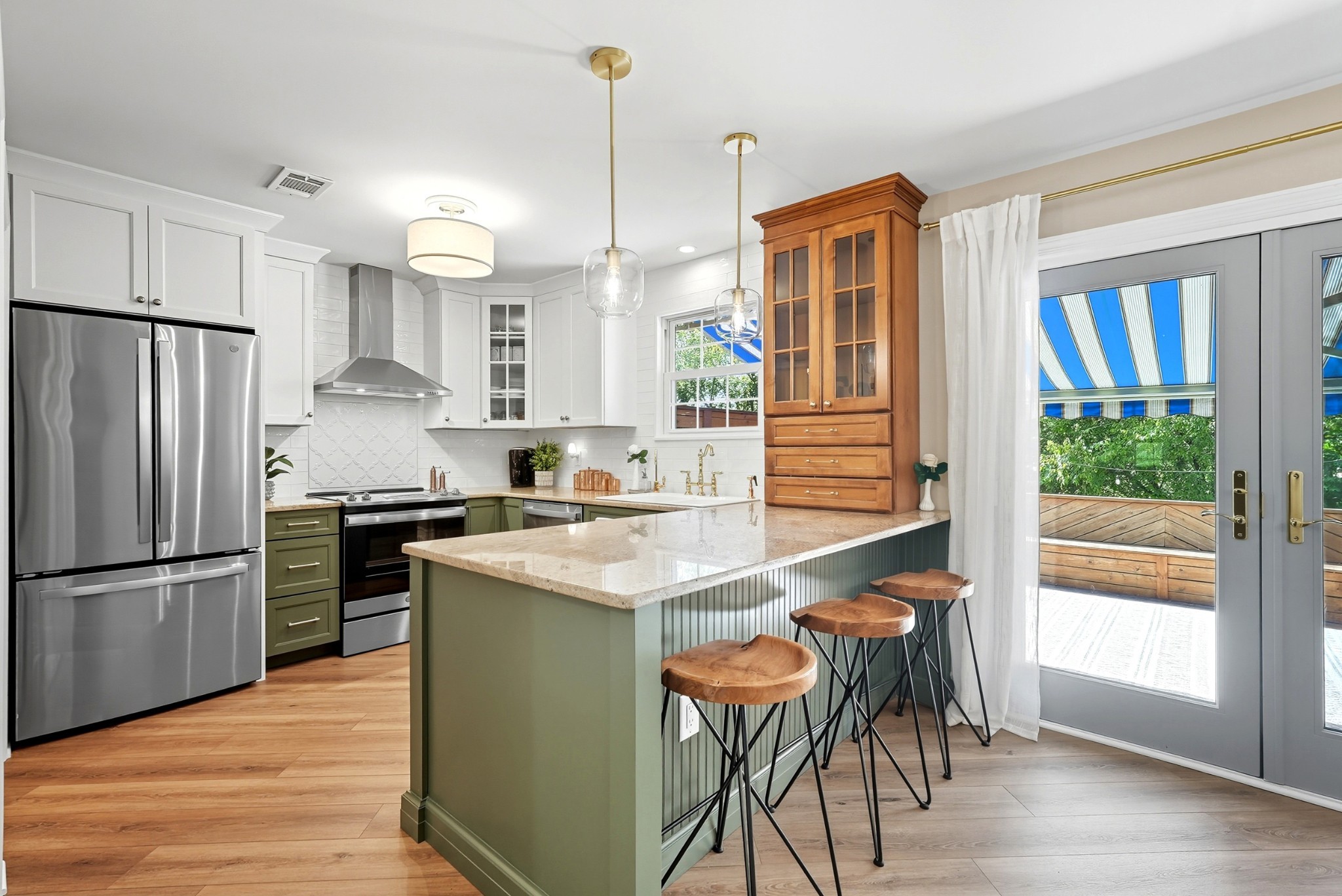 401 Huntington Ridge Drive Nashville, TN 37211 - Photo 6 of 38 a kitchen with stainless steel appliances granite countertop a refrigerator a sink dishwasher a stove and a refrigerator with wooden floor