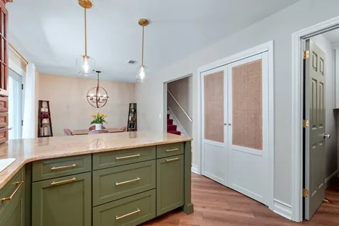 a view of a kitchen and sink